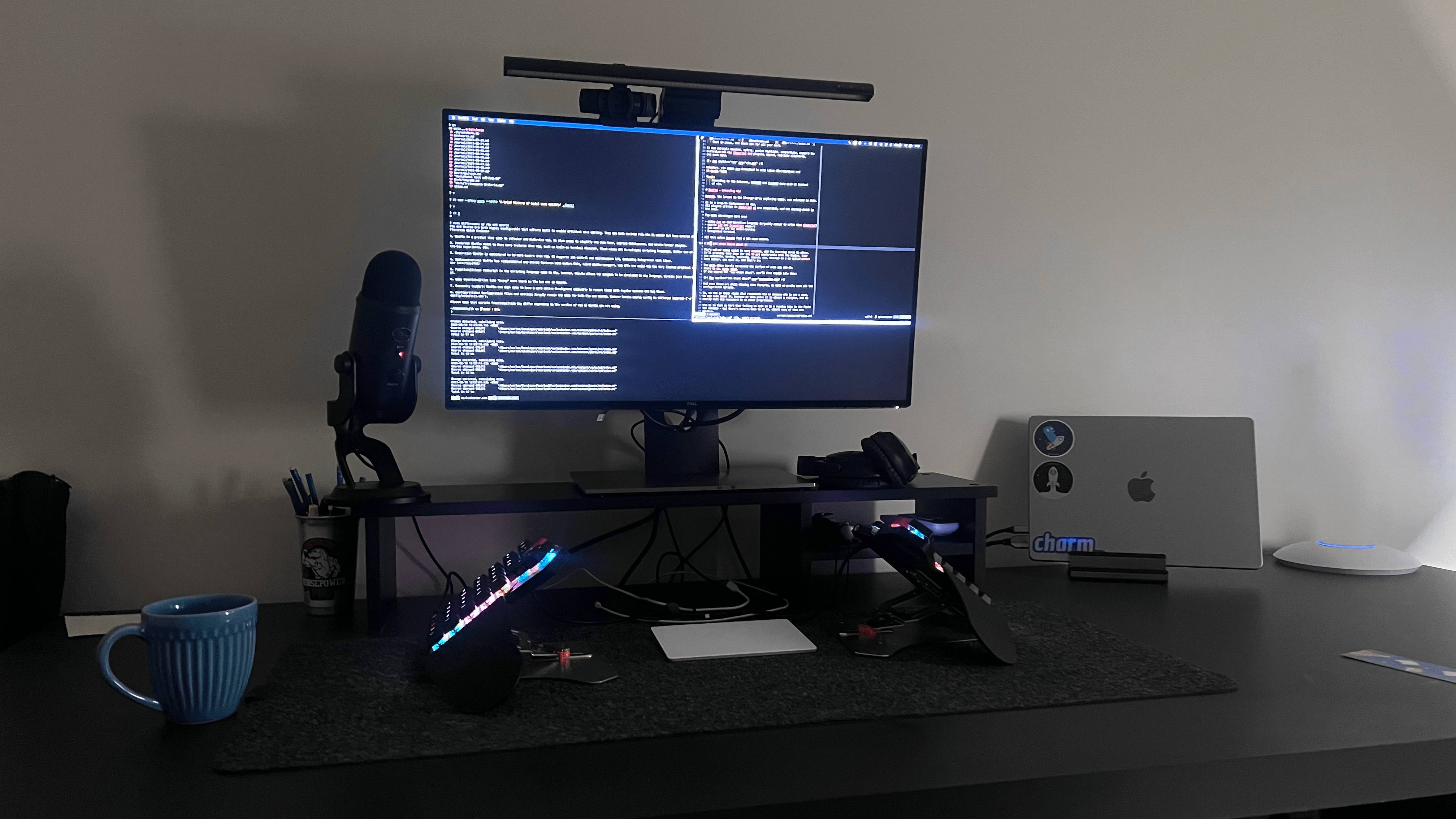 Me running neovim, 2023, colorized, weird keyboard over the table